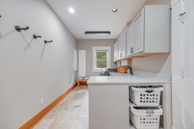 2 Timber Ridge Ln, Mansfield, IL 61854 - kitchen with a peninsula, light stone counters, and recessed lighting