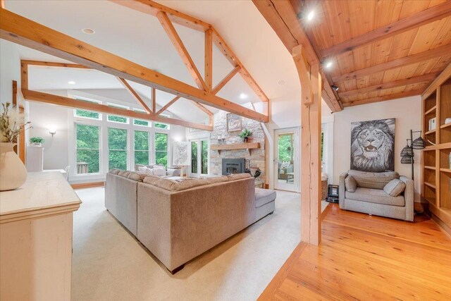 2 Timber Ridge Ln, Mansfield, IL 61854 - living room featuring light wood-style flooring, a stone fireplace, plenty of natural light, and recessed lighting