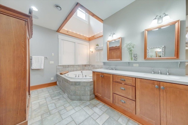 2 Timber Ridge Ln, Mansfield, IL 61854 - bathroom featuring stone finish floors, double vanity, and a bath