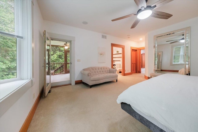 2 Timber Ridge Ln, Mansfield, IL 61854 - bedroom with light colored carpet, multiple windows, and ceiling fan
