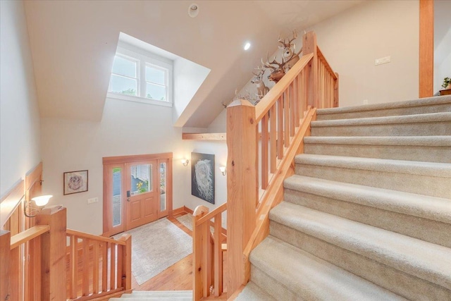 2 Timber Ridge Ln, Mansfield, IL 61854 - entryway with stairs, wood finished floors, and a high ceiling