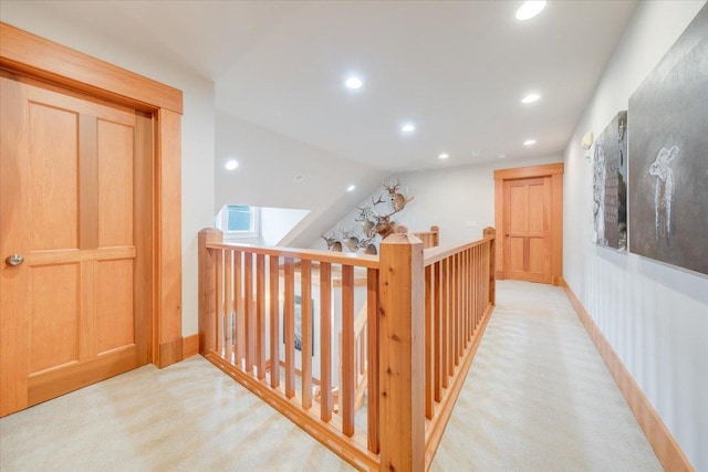 2 Timber Ridge Ln, Mansfield, IL 61854 - hallway with light carpet, recessed lighting, lofted ceiling, and an upstairs landing