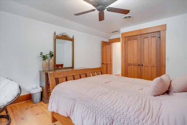2 Timber Ridge Ln, Mansfield, IL 61854 - bedroom featuring wood finished floors, a closet, and a ceiling fan
