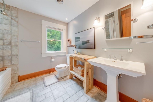 2 Timber Ridge Ln, Mansfield, IL 61854 - full bathroom featuring toilet and baseboards