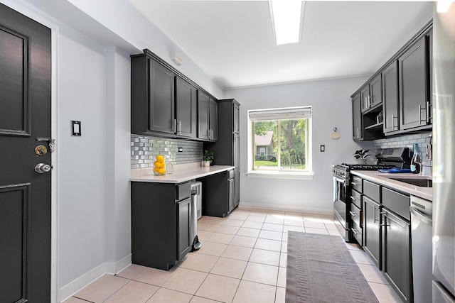 2648 Central Dr Unit Gn, Flossmoor, IL 60422 - kitchen with appliances with stainless steel finishes, decorative backsplash, light countertops, and light tile patterned flooring