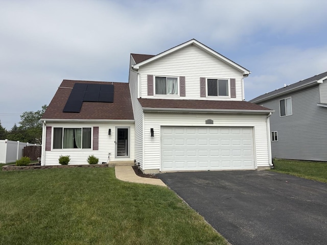 2109 Gray Hawk Dr, Plainfield, IL 60586 - traditional-style house featuring roof mounted solar panels, driveway, and an attached garage