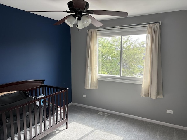 2109 Gray Hawk Dr, Plainfield, IL 60586 - carpeted bedroom with baseboards and a ceiling fan