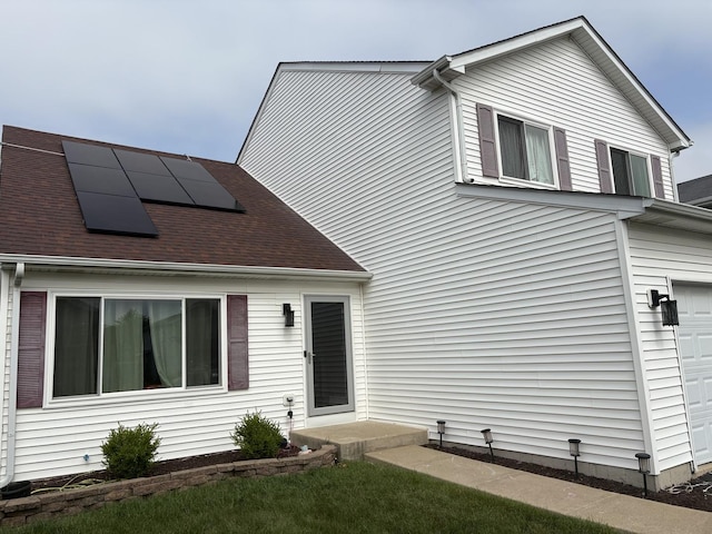 2109 Gray Hawk Dr, Plainfield, IL 60586 - view of front of house featuring roof mounted solar panels