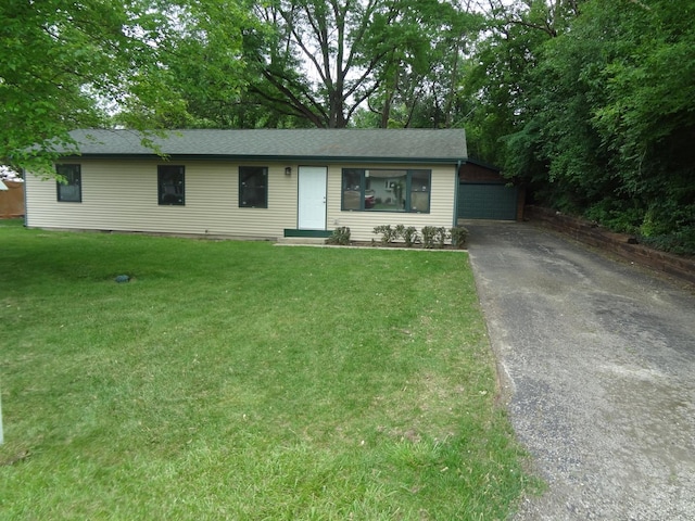 9802 Gallek Rd, Fox River Grove, IL 60021 - ranch-style home with a front lawn, an outbuilding, and roof with shingles