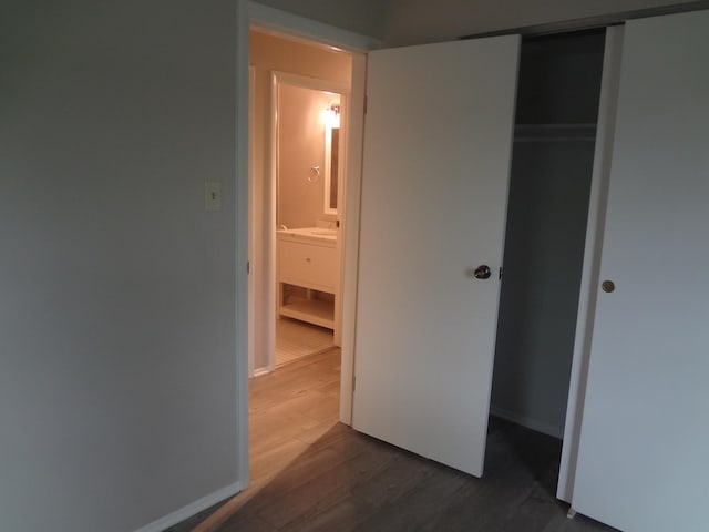 9802 Gallek Rd, Fox River Grove, IL 60021 - unfurnished bedroom with a closet and dark wood finished floors
