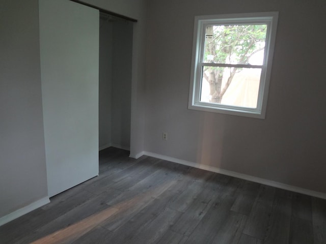 9802 Gallek Rd, Fox River Grove, IL 60021 - unfurnished bedroom featuring wood finished floors