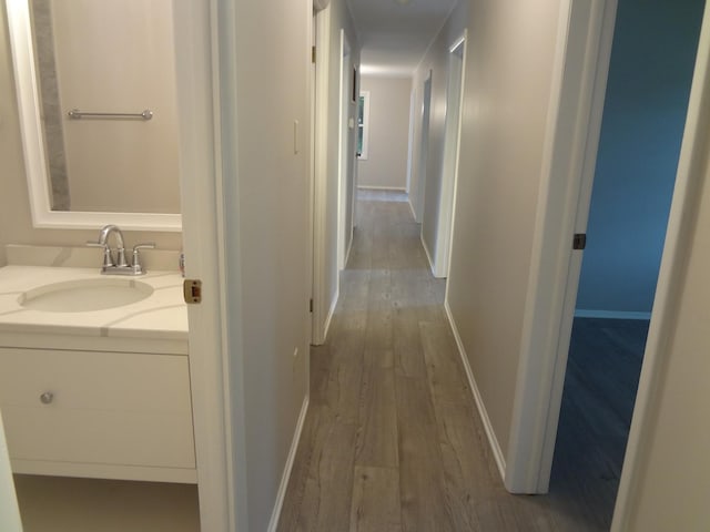 9802 Gallek Rd, Fox River Grove, IL 60021 - corridor featuring a sink and wood finished floors