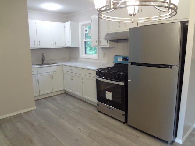 9802 Gallek Rd, Fox River Grove, IL 60021 - kitchen featuring appliances with stainless steel finishes, under cabinet range hood, light wood-style floors, white cabinets, and a chandelier