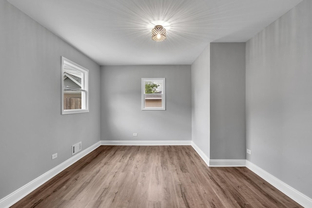 5707 W 82nd Pl, Burbank, IL 60459 - spare room with wood finished floors and baseboards