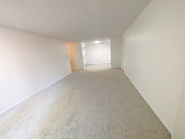 1125 Lake Cook Rd Unit 209, Northbrook, IL 60062 - finished basement featuring light carpet and baseboards