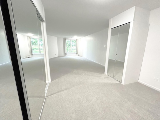 1125 Lake Cook Rd Unit 209, Northbrook, IL 60062 - below grade area featuring carpet floors and baseboards