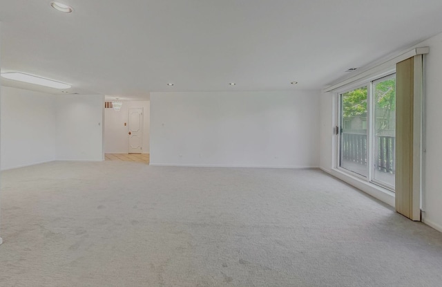 1125 Lake Cook Rd Unit 209, Northbrook, IL 60062 - empty room with light carpet and recessed lighting