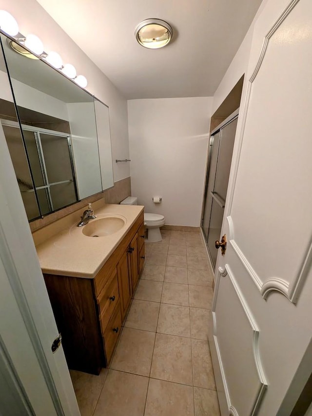 1125 Lake Cook Rd Unit 209, Northbrook, IL 60062 - full bath with vanity, a stall shower, and tile patterned floors