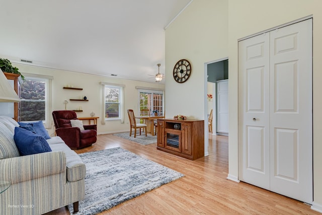 13832 S Balsam Ln Unit B, Plainfield, IL 60544 - living room with light wood-type flooring, high vaulted ceiling, and a ceiling fan