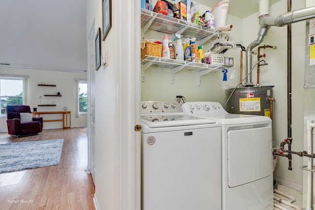 13832 S Balsam Ln Unit B, Plainfield, IL 60544 - laundry area featuring separate washer and dryer and light wood-style flooring