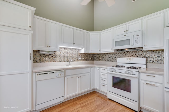 13832 S Balsam Ln Unit B, Plainfield, IL 60544 - kitchen featuring white appliances, light countertops, tasteful backsplash, white cabinetry, and ceiling fan