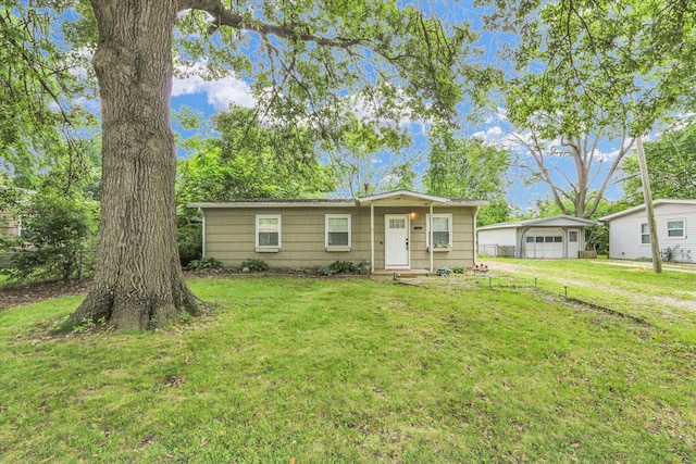 1825 Parkdale Dr, Champaign, IL 61821 - view of front of home with a garage and a front yard