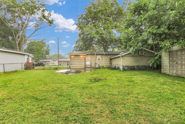 1825 Parkdale Dr, Champaign, IL 61821 - view of yard featuring a storage unit
