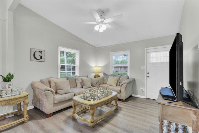 1825 Parkdale Dr, Champaign, IL 61821 - living area featuring a ceiling fan, wood finished floors, and lofted ceiling
