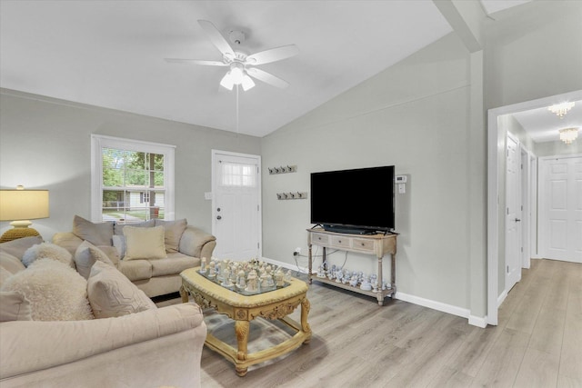 1825 Parkdale Dr, Champaign, IL 61821 - living area featuring light wood finished floors, vaulted ceiling, and a ceiling fan