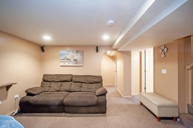 928 Grey Ave, Evanston, IL 60202 - living area with arched walkways, light carpet, and recessed lighting