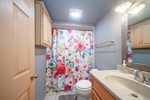 928 Grey Ave, Evanston, IL 60202 - bathroom featuring vanity, tile patterned floors, and a shower with shower curtain
