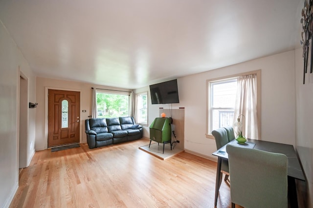 928 Grey Ave, Evanston, IL 60202 - living area featuring light wood-style flooring and baseboards