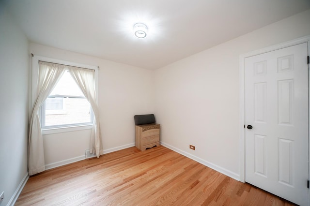 928 Grey Ave, Evanston, IL 60202 - unfurnished bedroom featuring light wood finished floors and baseboards
