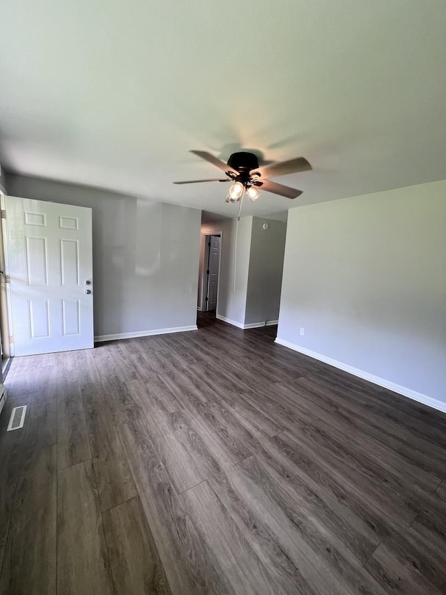 6643 S 13370e Rd, Pembroke Twp, IL 60958 - unfurnished living room with dark wood-type flooring and a ceiling fan