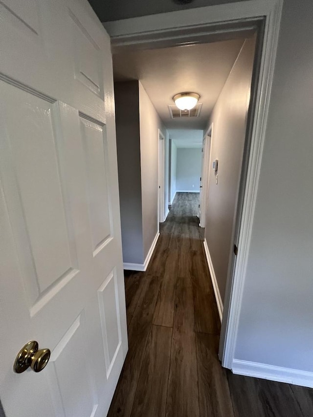 6643 S 13370e Rd, Pembroke Twp, IL 60958 - corridor with dark wood-type flooring and baseboards