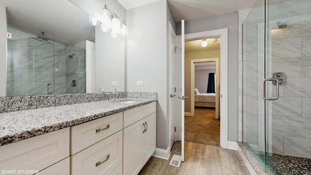 14948 S Preserve Dr, Lockport, IL 60441 - ensuite bathroom featuring vanity, a stall shower, and wood finished floors