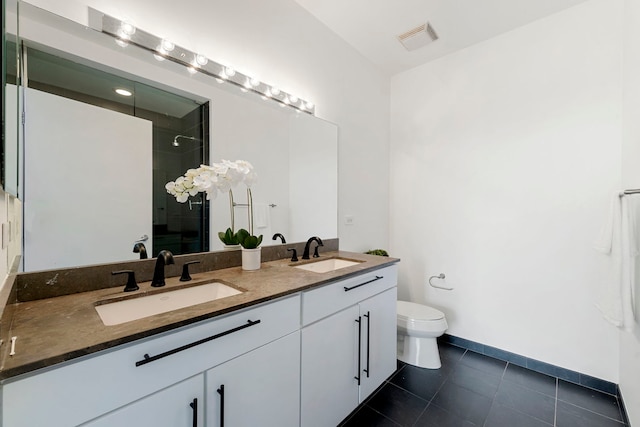 700 N Larrabee St Unit 2010, Chicago, IL 60654 - full bath featuring double vanity, tiled shower, and tile patterned floors