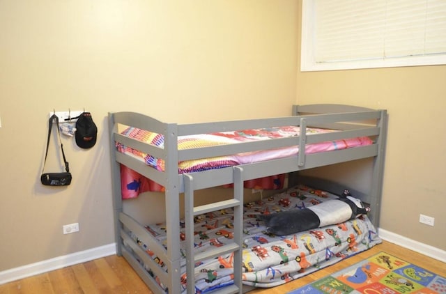 4435 S Oakenwald Ave Unit 1, Chicago, IL 60653 - bedroom with wood finished floors and baseboards
