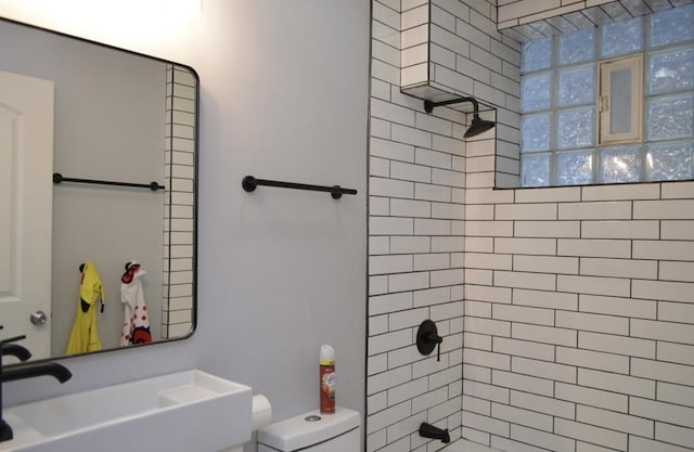 4435 S Oakenwald Ave Unit 1, Chicago, IL 60653 - bathroom featuring a sink and shower / bathtub combination