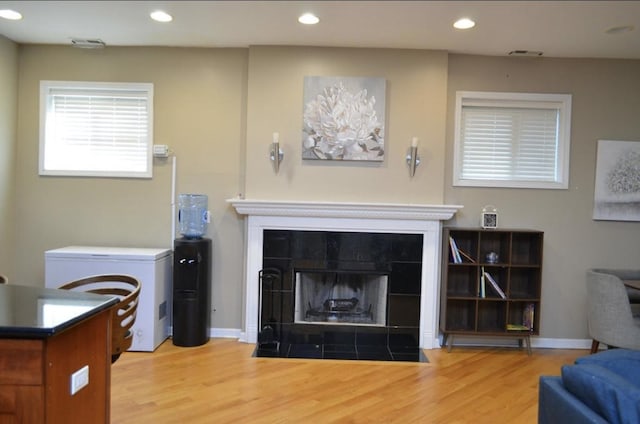 4435 S Oakenwald Ave Unit 1, Chicago, IL 60653 - living room with wood finished floors, recessed lighting, and a fireplace