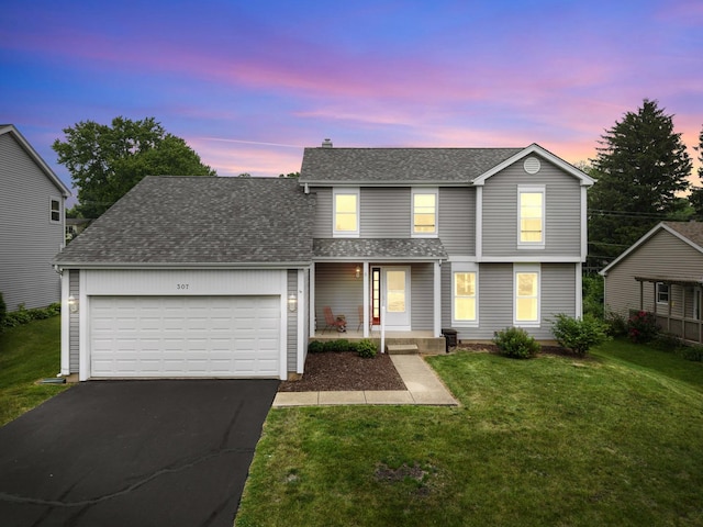 307 Valley Rd, North Aurora, IL 60542 - view of front of house with roof with shingles, a garage, asphalt driveway, covered porch, and a lawn