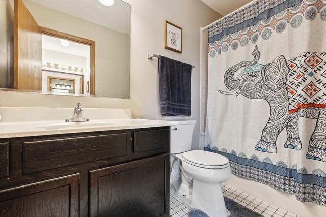 307 Valley Rd, North Aurora, IL 60542 - full bathroom with vanity, tile patterned flooring, and a shower with shower curtain
