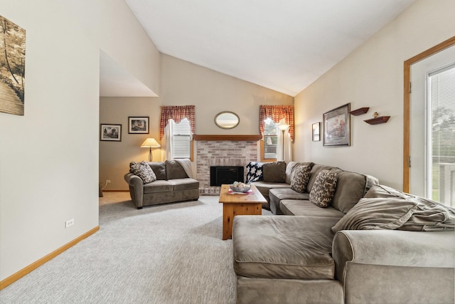 307 Valley Rd, North Aurora, IL 60542 - living room with carpet floors, a brick fireplace, and vaulted ceiling