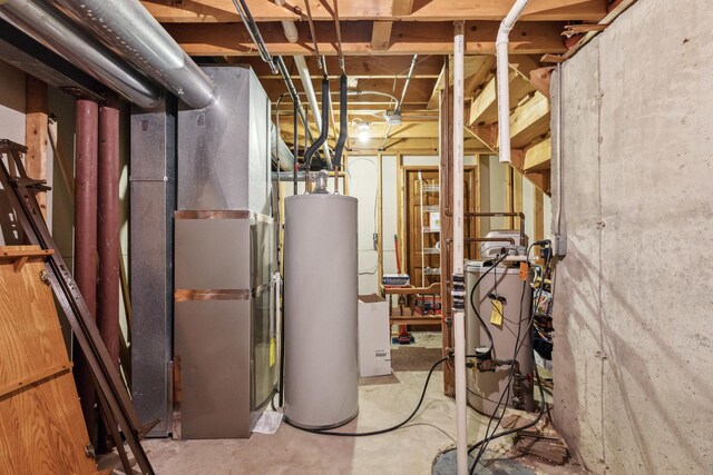 307 Valley Rd, North Aurora, IL 60542 - utility room featuring water heater and a heating unit
