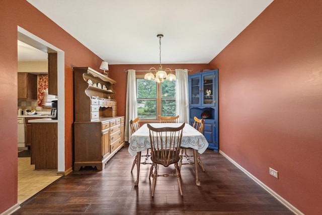 307 Valley Rd, North Aurora, IL 60542 - dining space with a chandelier and wood finished floors