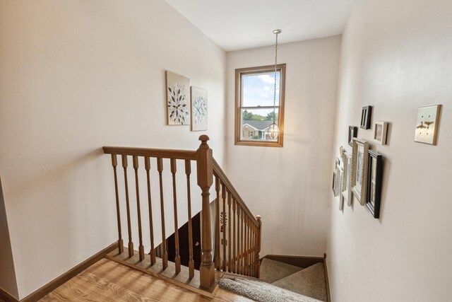 307 Valley Rd, North Aurora, IL 60542 - stairway with wood finished floors and baseboards
