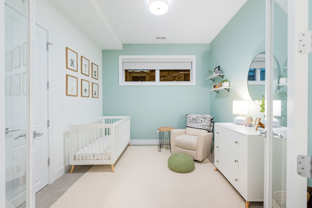 832 W Altgeld St Unit 1, Chicago, IL 60614 - bedroom featuring a nursery area and light colored carpet