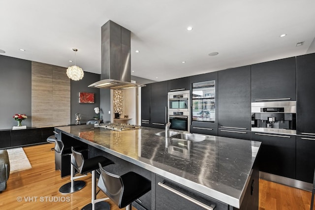 1711 W Division St Unit 303, Chicago, IL 60622 - kitchen with modern cabinets, dark cabinets, and recessed lighting