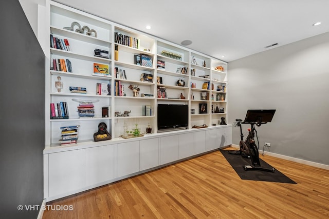 1711 W Division St Unit 303, Chicago, IL 60622 - exercise area featuring light wood-style floors and recessed lighting