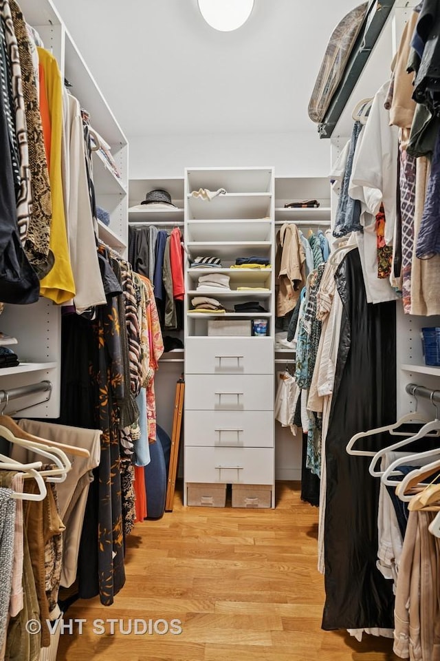 1711 W Division St Unit 303, Chicago, IL 60622 - walk in closet featuring wood finished floors